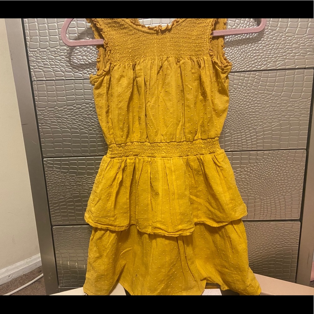 A mustard yellow dress